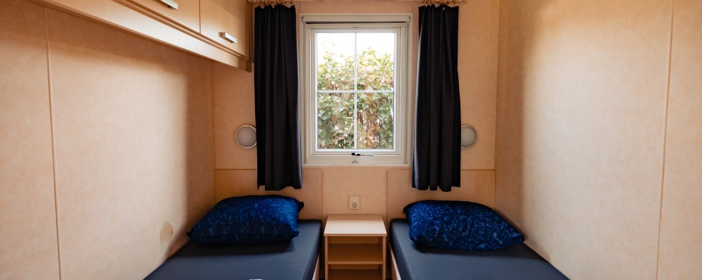 Acacia- slaapkamers twee aparte bedden.jpg